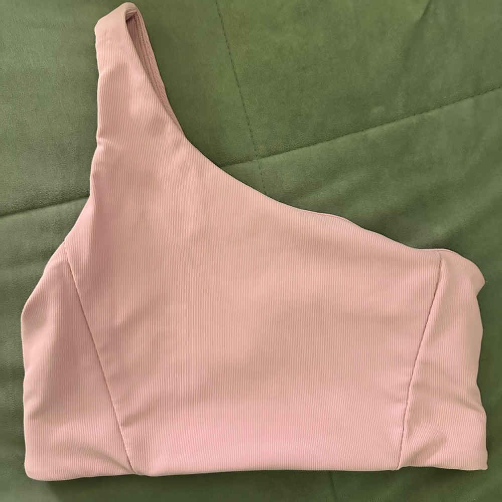 Pink ribbed one shoulder sports bra